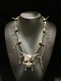 Silver Horned Stitched Doll Face Necklace with Cleaver, Knife & Coffin Charms