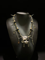 Silver Horned Stitched Doll Face Necklace with Cleaver, Knife & Coffin Charms