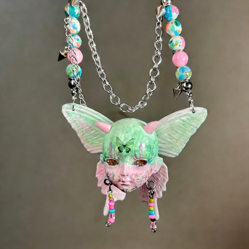 Pastel Goth Green Moth Doll Face Necklace with Pink Horns & Candy Beads - Crux Jewelry product image 1