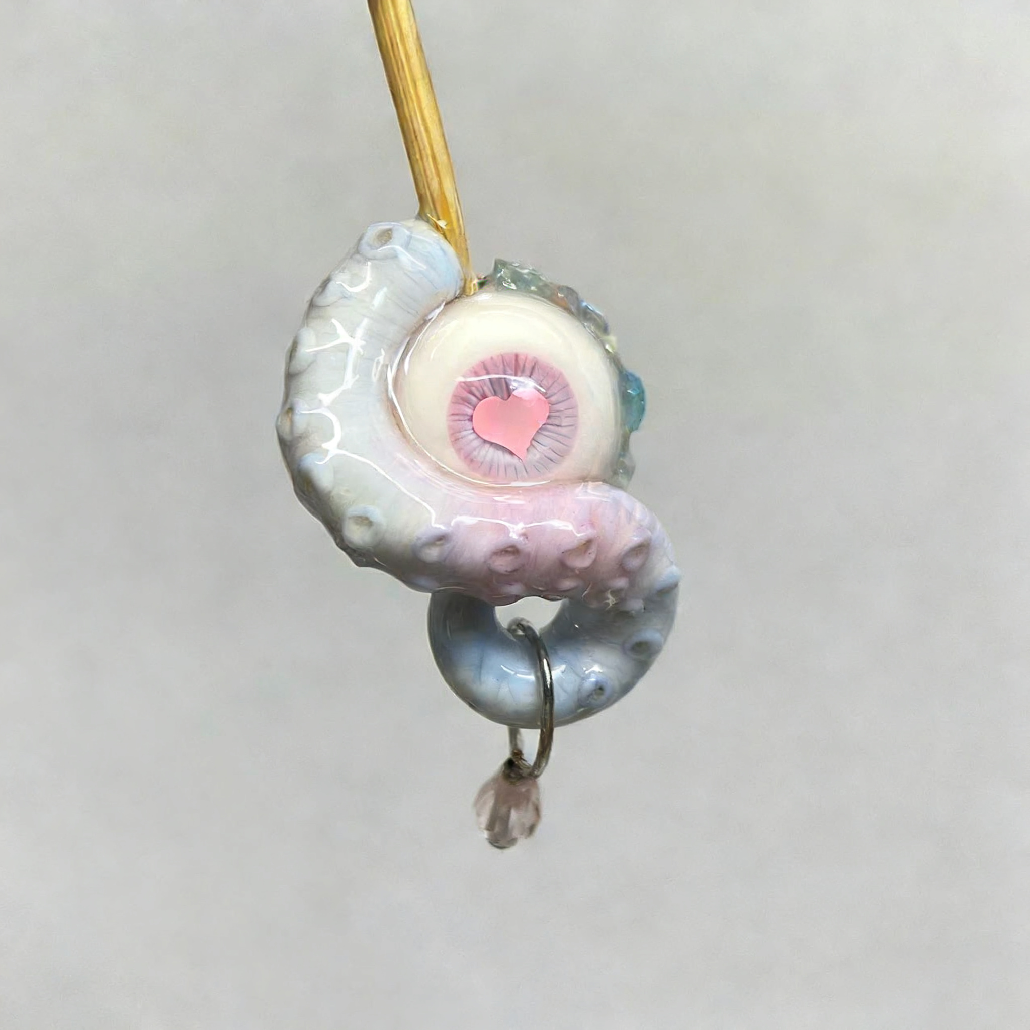Cthulhu Eye – Heart Detail Octopus Tentacle Earrings in Blue & Pink