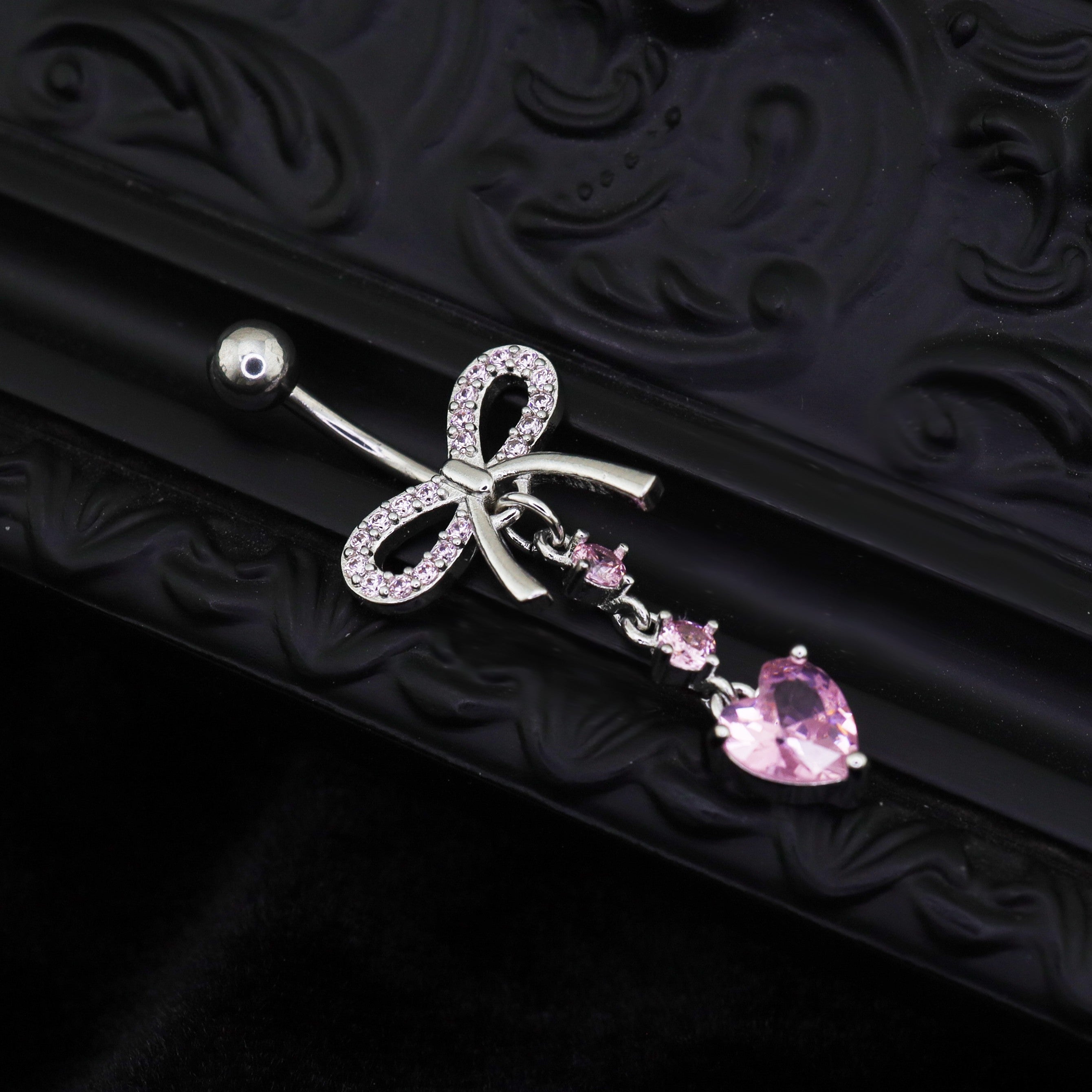 Heart-shaped CZ bow tie Dangle Belly Ring - Heart-shaped CZ bow tie Dangle Belly Ring - radiant-white by CRUXJEWELRY