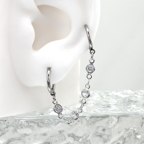 Boucles d'oreilles en acier inoxydable à double trou avec chaîne en zircon cubique 