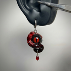 Cthulhu Eye – Vertical Pupil Octopus Tentacle Earrings in Deep Red