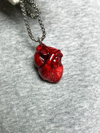 Cthulhu Eye - Beating Dark Heart Necklaces - Cthulhu Eye - Beating Dark Heart Necklaces - Vein Pulse by CRUXJEWELRY