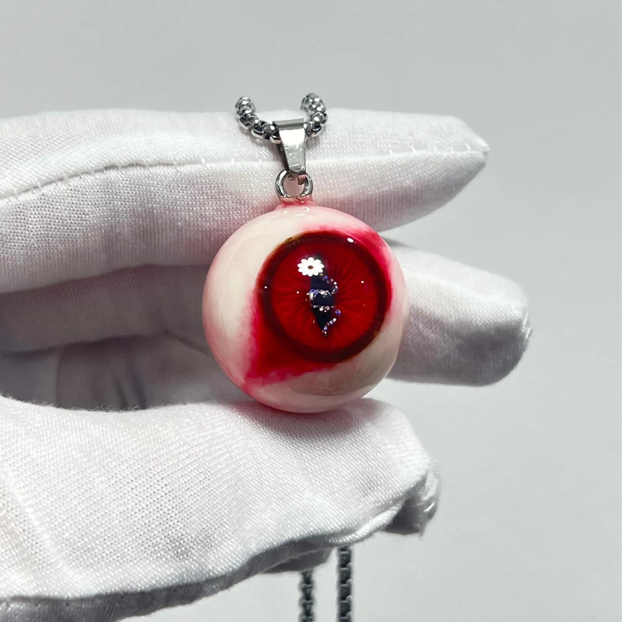 "Forbidden Fruit" Red Snake Eye Necklace - Wavy Pupil & Daisy Detail