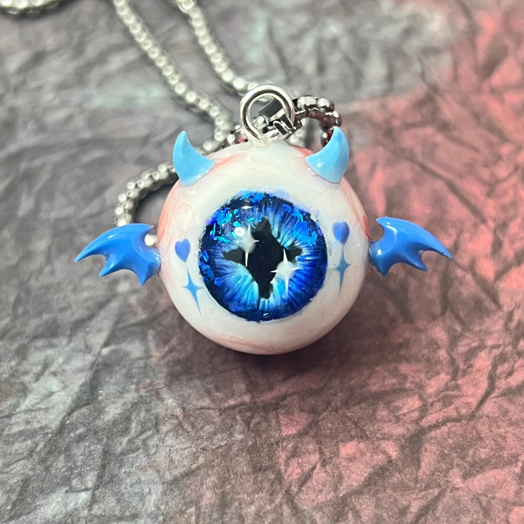 "The Crux" Blue Demon Eye Necklace - Signature Cross Pupil