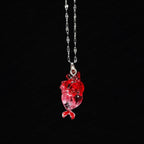 "The Little Mermaid" Fossilized Heart Necklace - Skeleton Tail Detail
