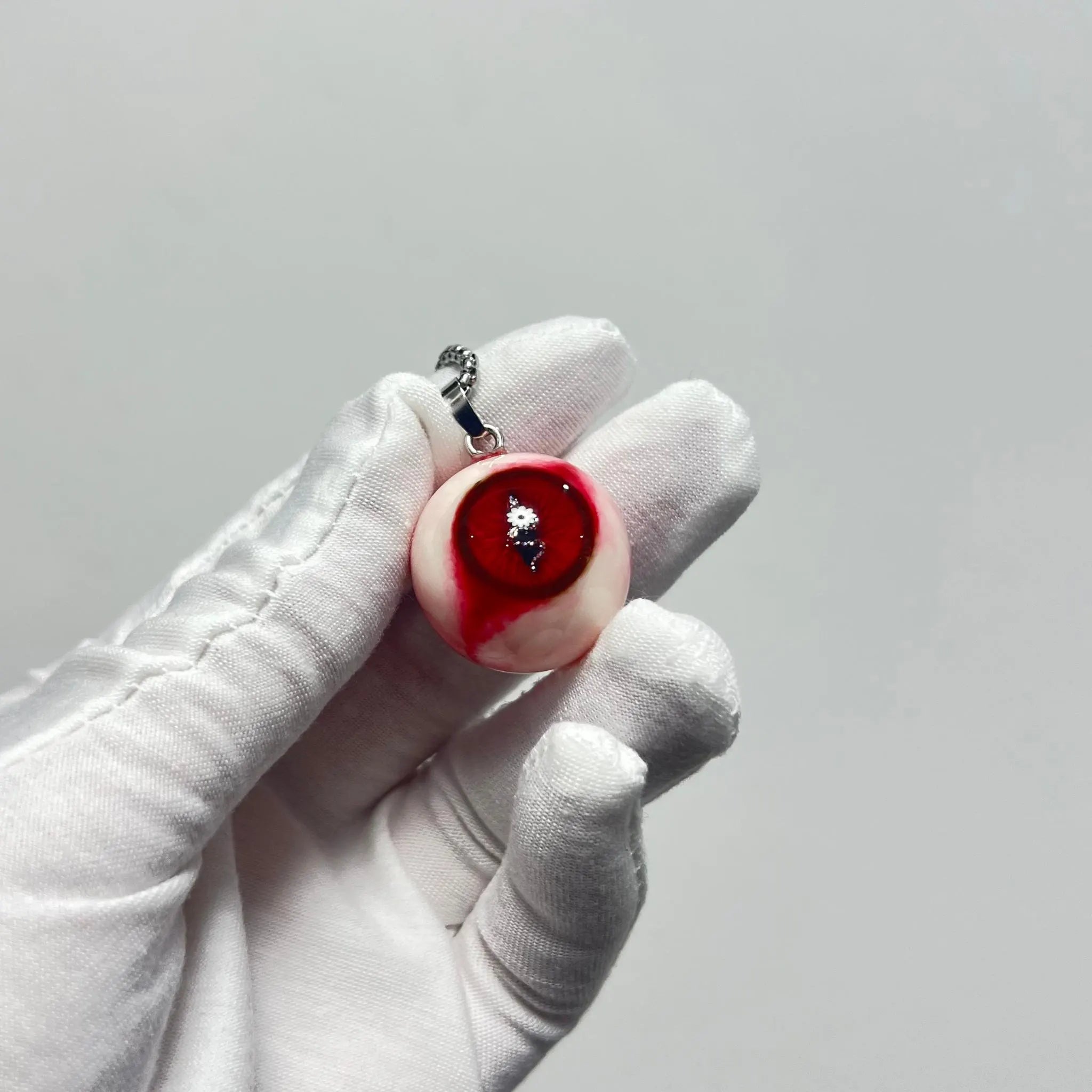 "Forbidden Fruit" Red Snake Eye Necklace - Wavy Pupil & Daisy Detail
