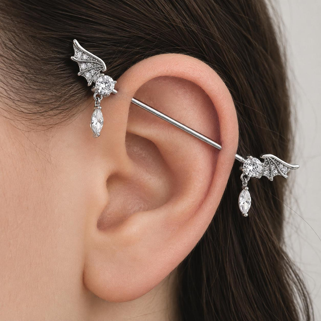 Bat Wing Crystal titanium industrial barbell, detail view 2
