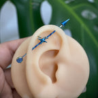 Celestial Arrow titanium industrial barbell, detail view 3