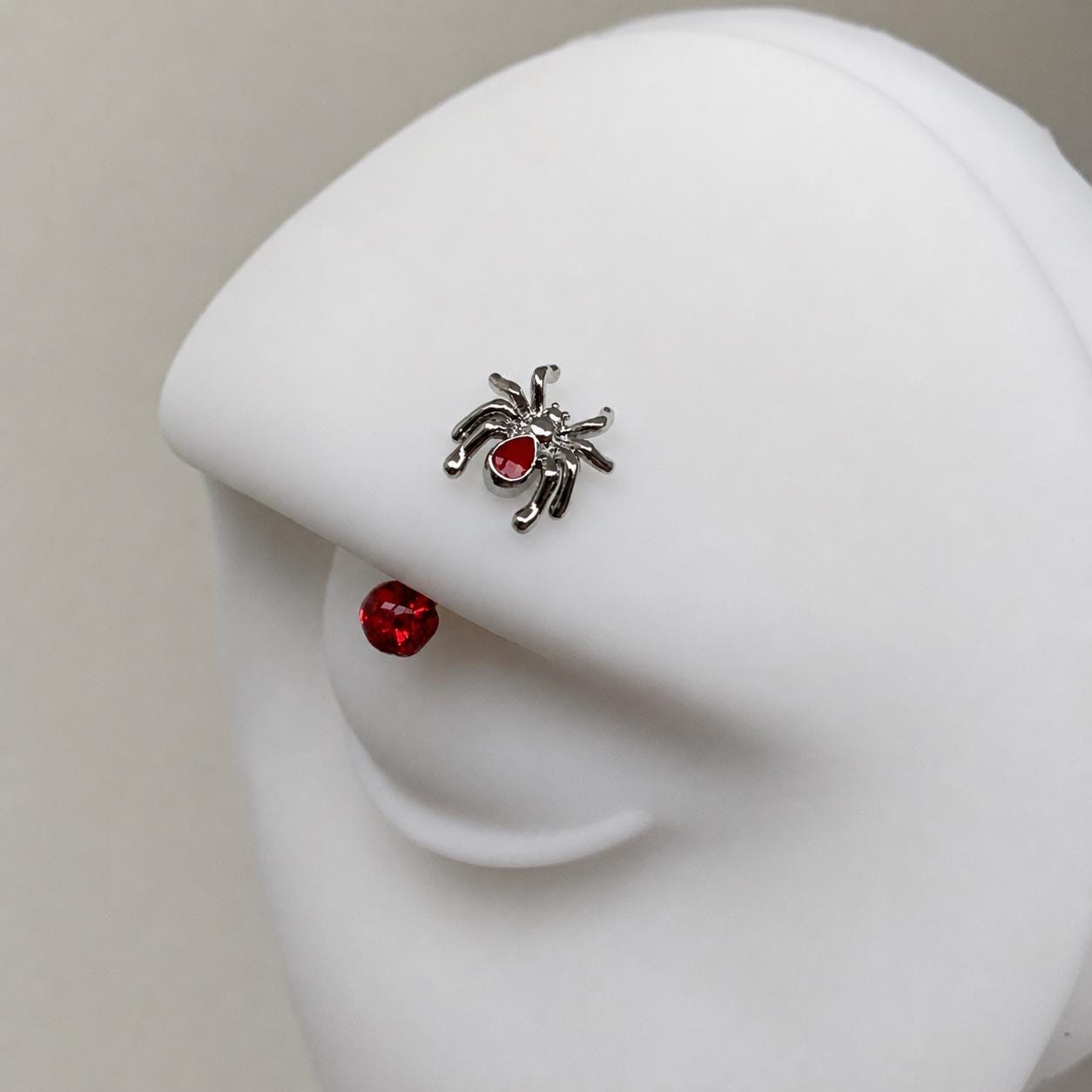 Red Gem Spider Titanium Eyebrow Barbell detail 3