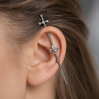 Fleur-de-Lis Sword titanium industrial barbell, detail view 2