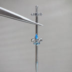 Fleur-de-Lis Sword titanium industrial barbell, detail view 5