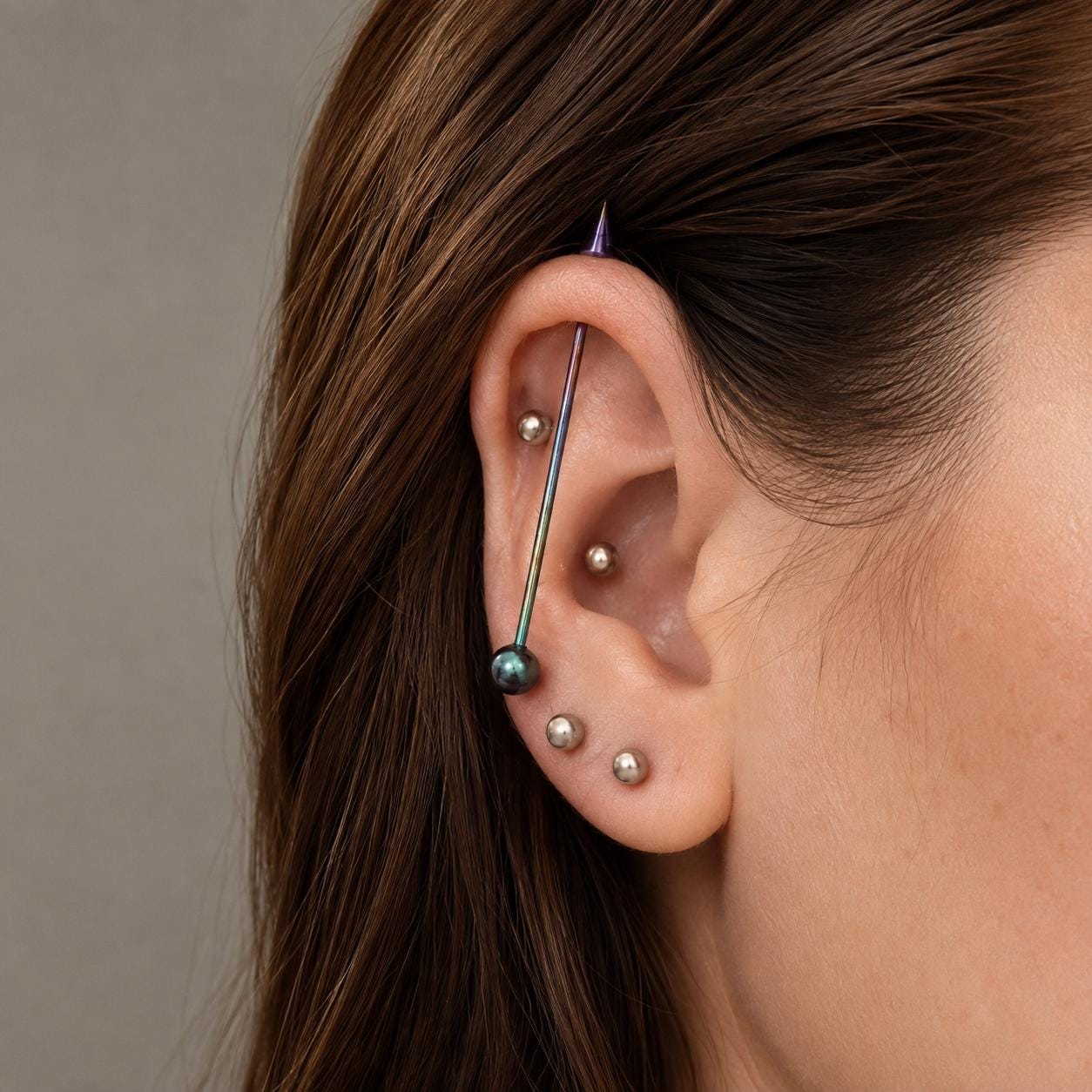 Offset Geometric titanium industrial barbell, detail view 2