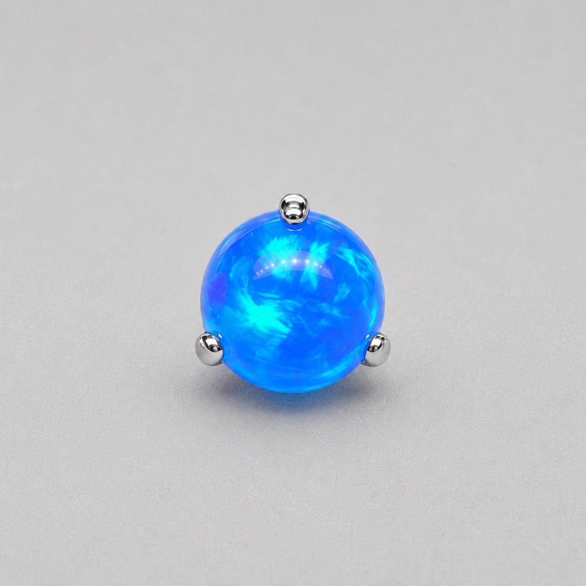 Aurora Glow Jelly Opal OP502 Neon Blue F136 Titanium piercing top