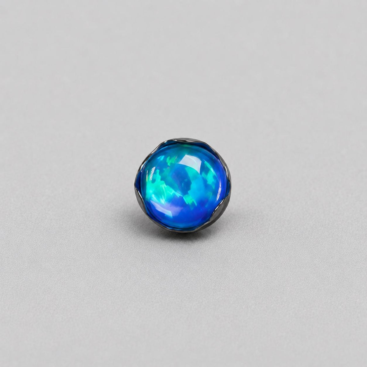 Ripple-Edge Jelly Opal OP505 Deep Blue F136 Titanium piercing top