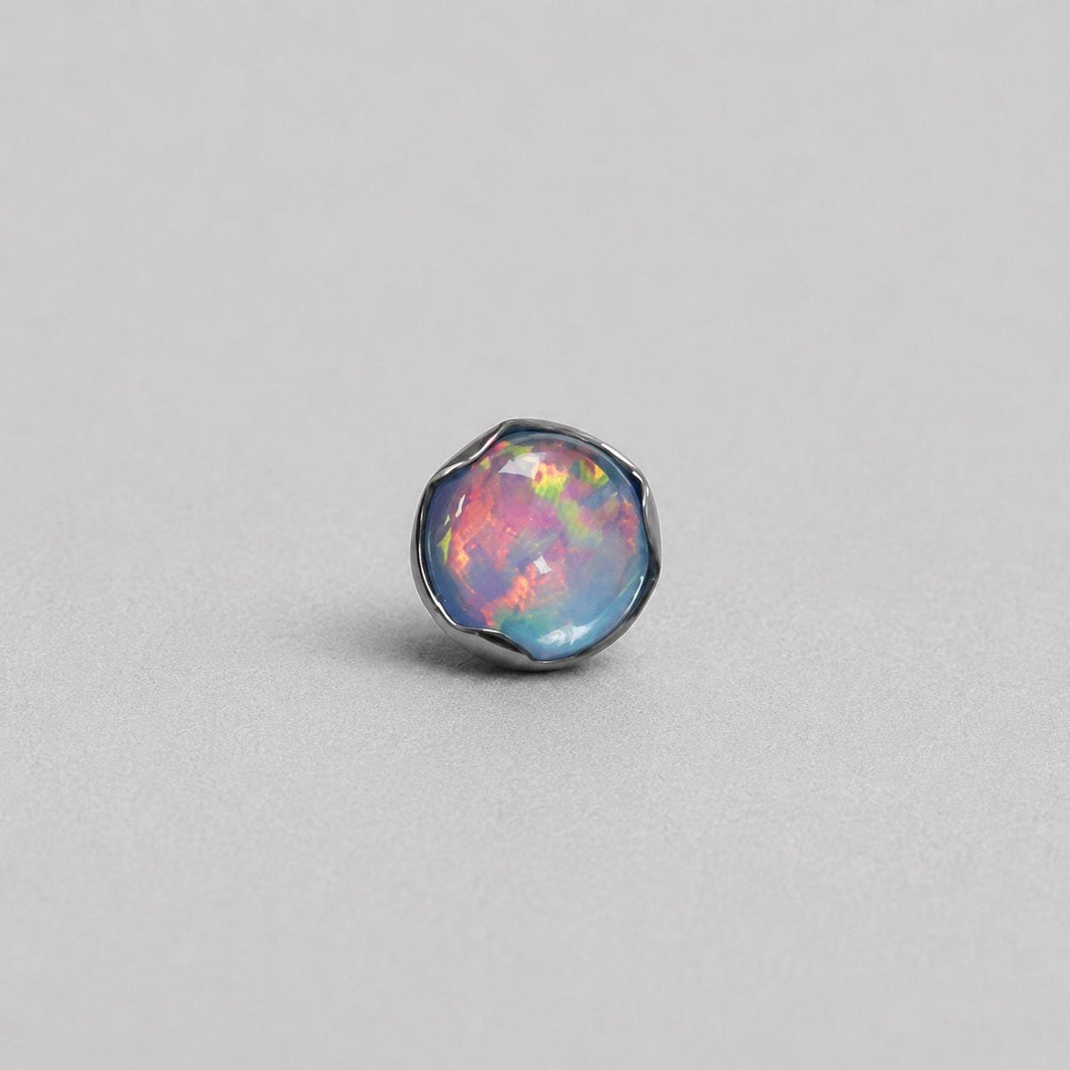 Ripple-Edge Jelly Opal OP509 Blue Gray F136 Titanium piercing top