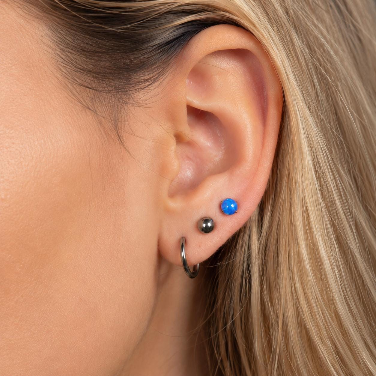 Solar Flare Fire Opal F136 Titanium piercing top detail 4