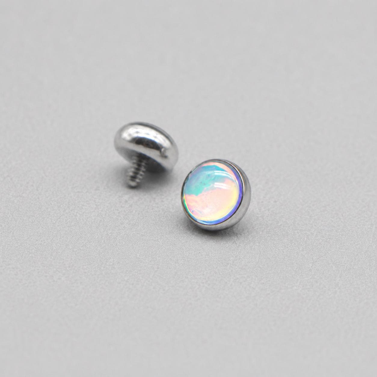 Liquid Aura Cabochon Light Blue F136 Titanium piercing top