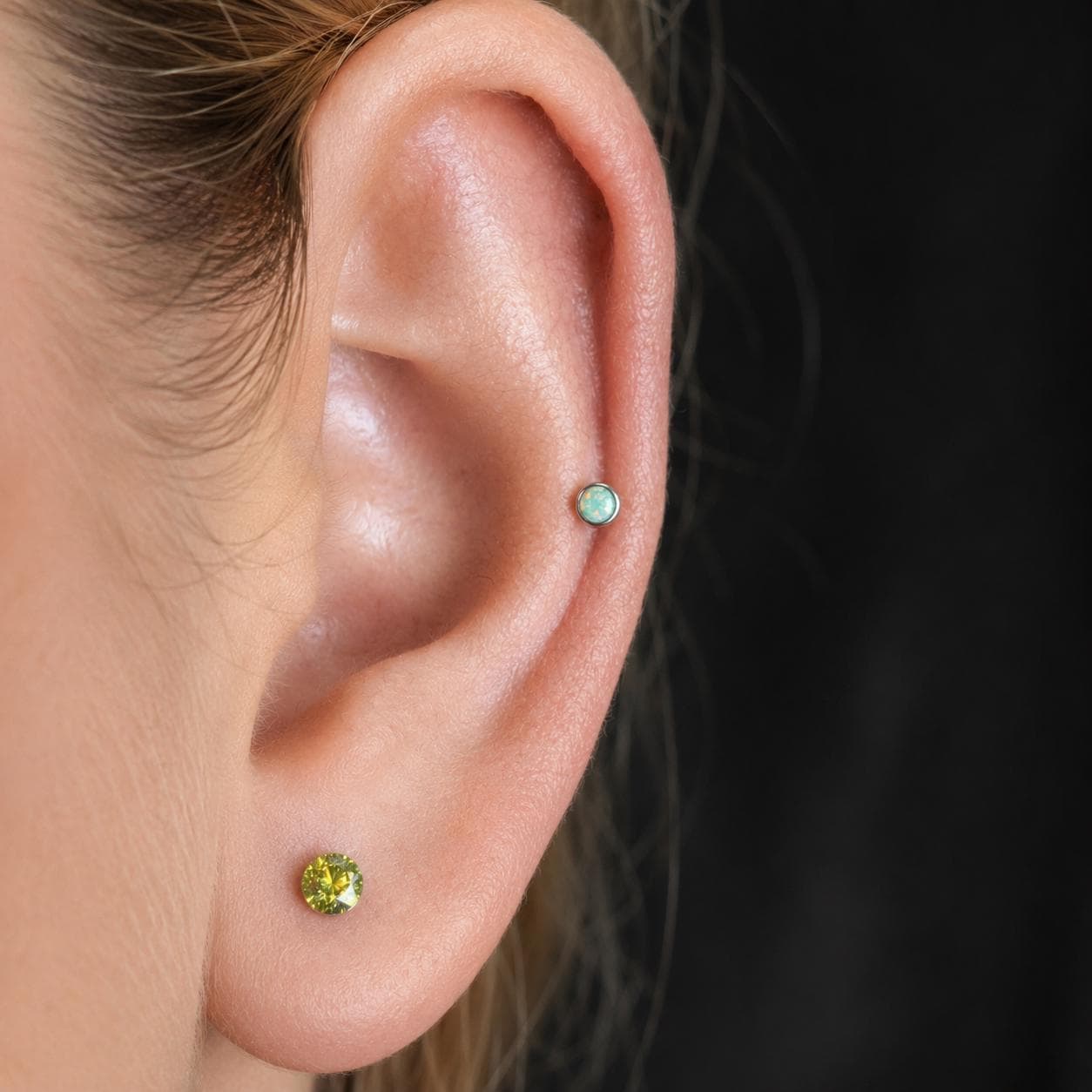 Solar Pulse Fire Opal F136 Titanium piercing top detail 2