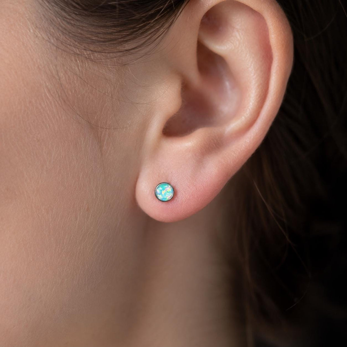 Solar Pulse Fire Opal F136 Titanium piercing top detail 3