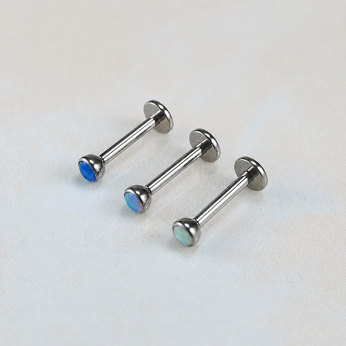 Solar Pulse Fire Opal F136 Titanium piercing top detail 5