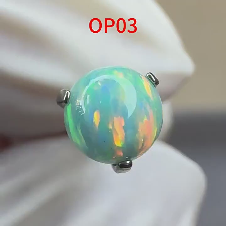 Solar Flare Fire Opal F136 Titanium piercing top video 1